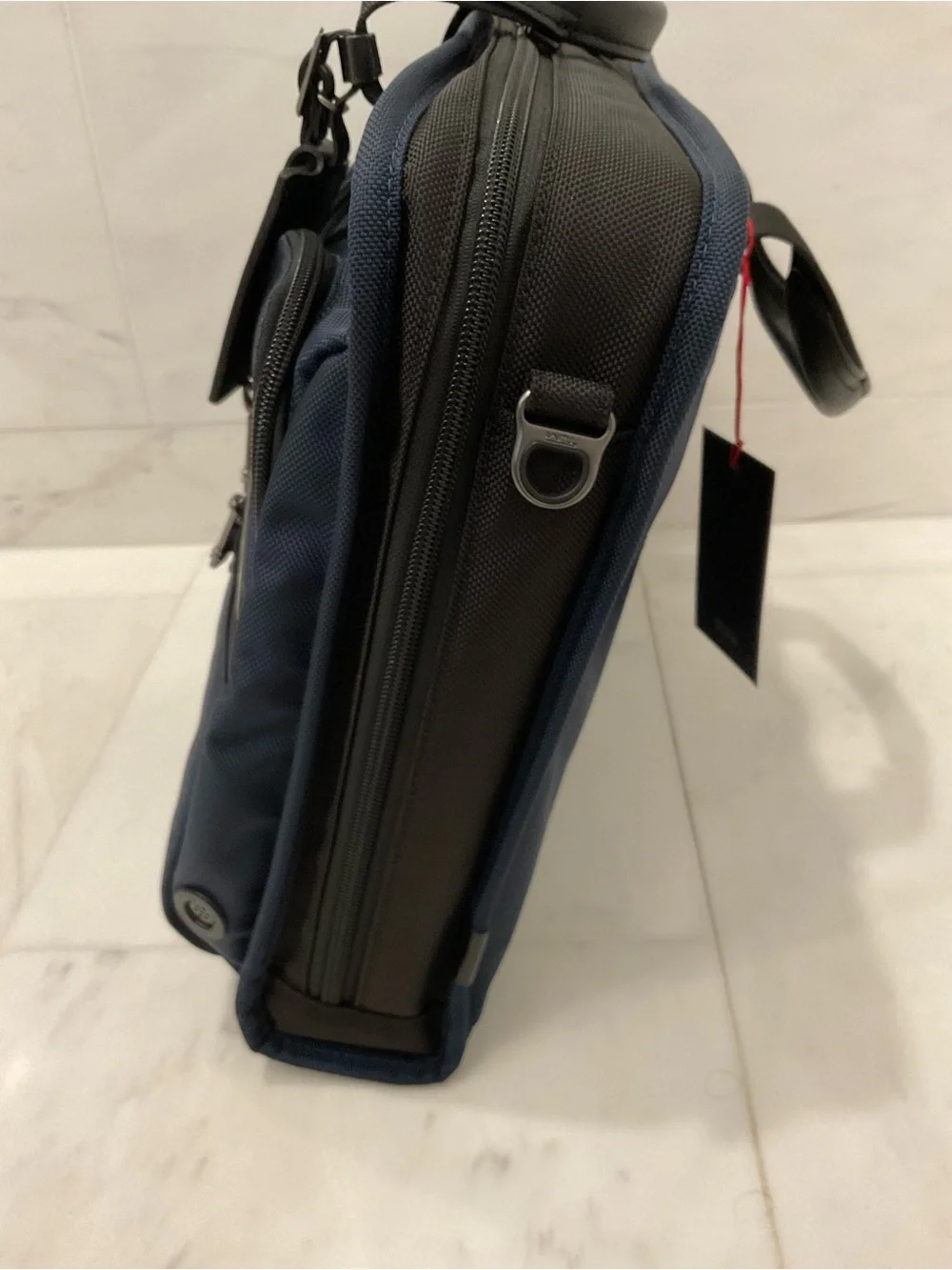 Tumi up sale